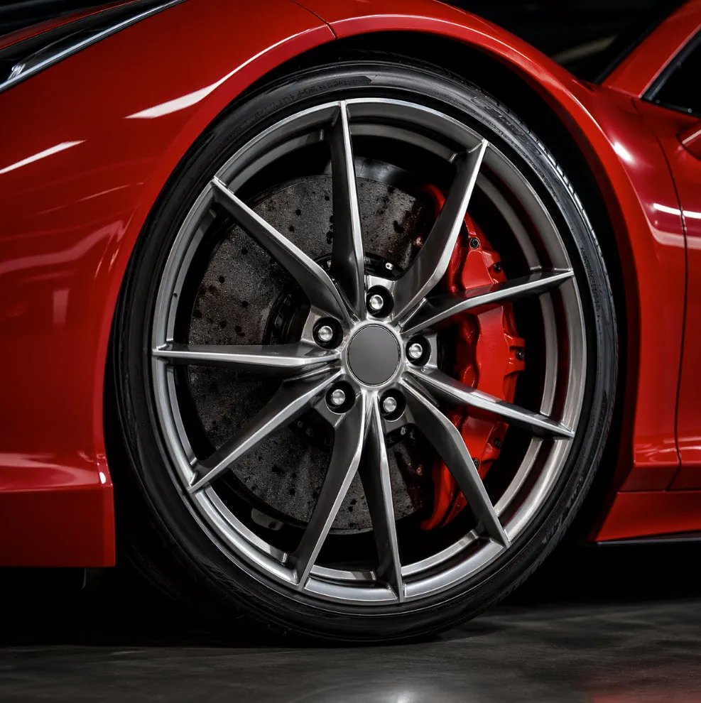 Close-up of a ferrari rim style luxury sports car wheel
