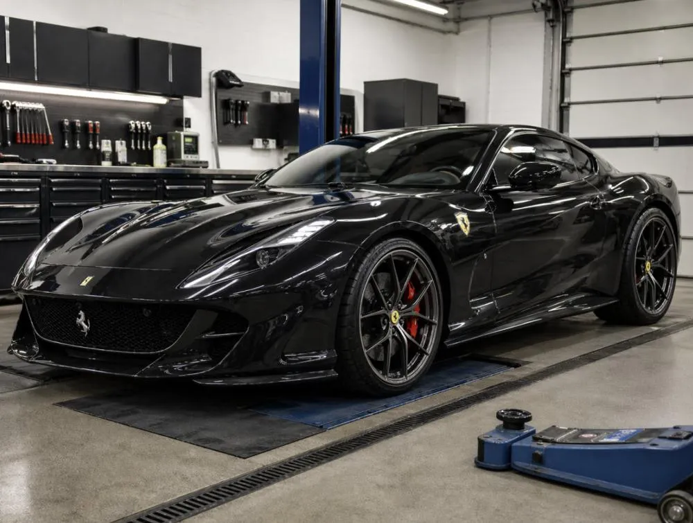 Luxury car in a garage ready for wheel inspection